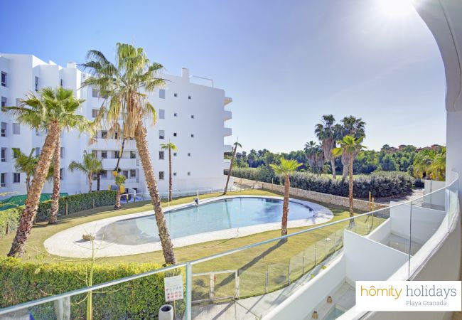 Lejlighed i Motril - Mar de Fabiola - Apartamento de lujo con vistas a la piscina y jardín 