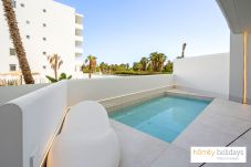 Lejlighed i Motril - Apartamento de lujo con piscina privada y vistas al campo de golf