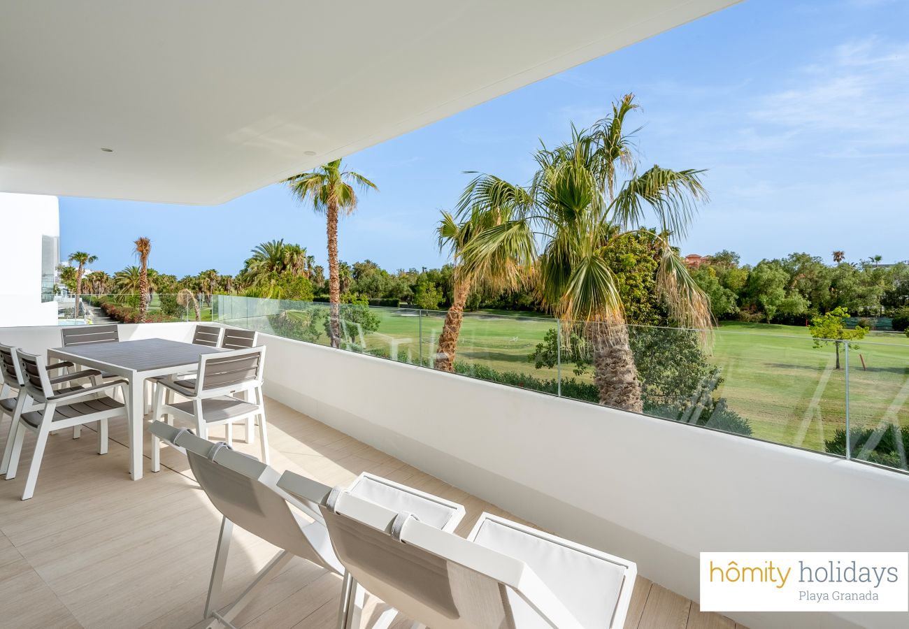 Lejlighed i Motril - Apartamento de lujo con vistas al campo de golf y jardín